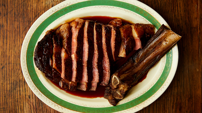 Devour perfectly cooked prime cuts at The Quality Chop House. Credit: Sam Harris. Image courtesy of The Quality Chop House. A plate of sliced steak in its jus