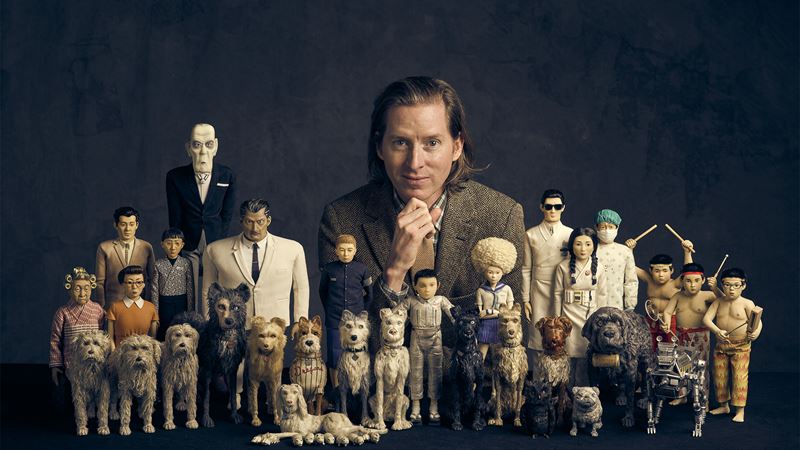 Wes Anderson: The Archives at the Design Museum. Image courtesy of Design Museum/Charlie Gray. American filmmaker Wes Anderson with a collection of models