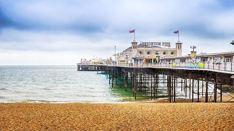 The beach with Brighton Pier. Image courtesy of VisitBritain