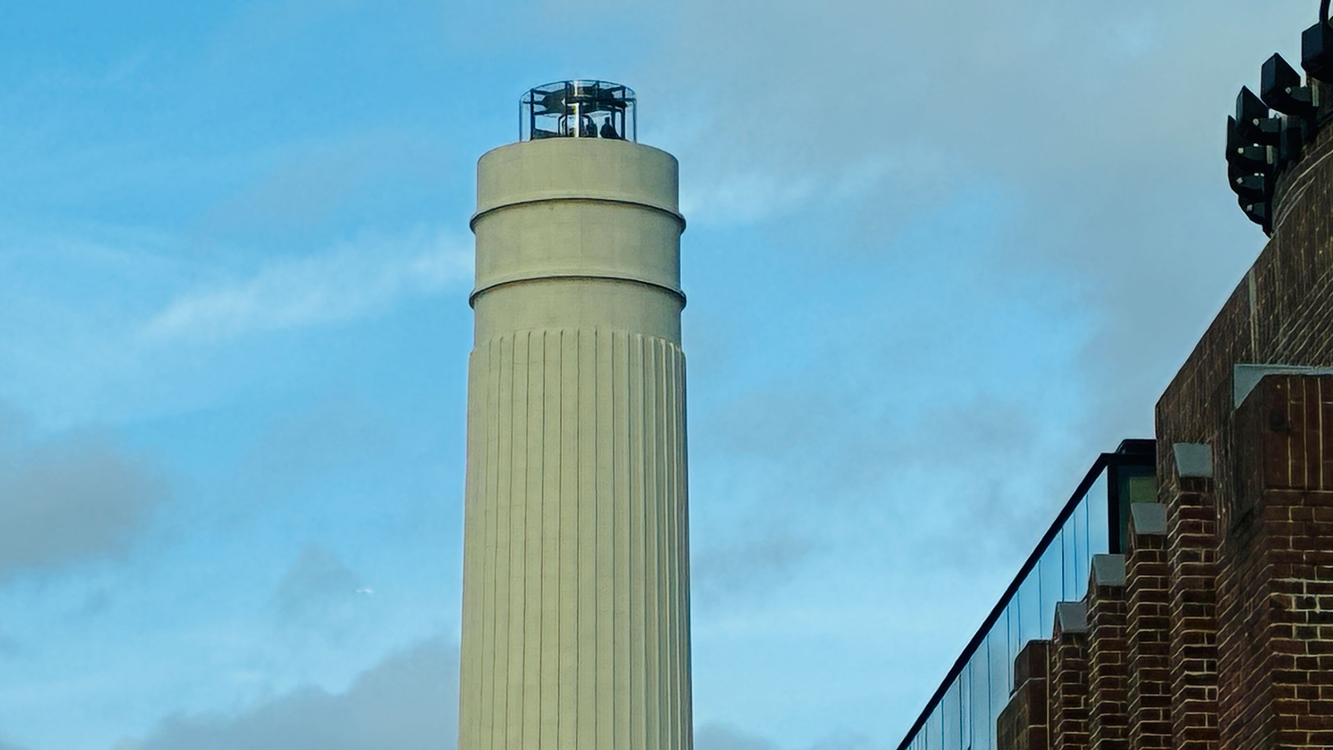 See London from a unique viewpoint on The Chimney Lift © Chantal Welch. Image courtesy of Chantal Welch. A chimney at Battersea Power station with the Chimney Lift popped out above the top