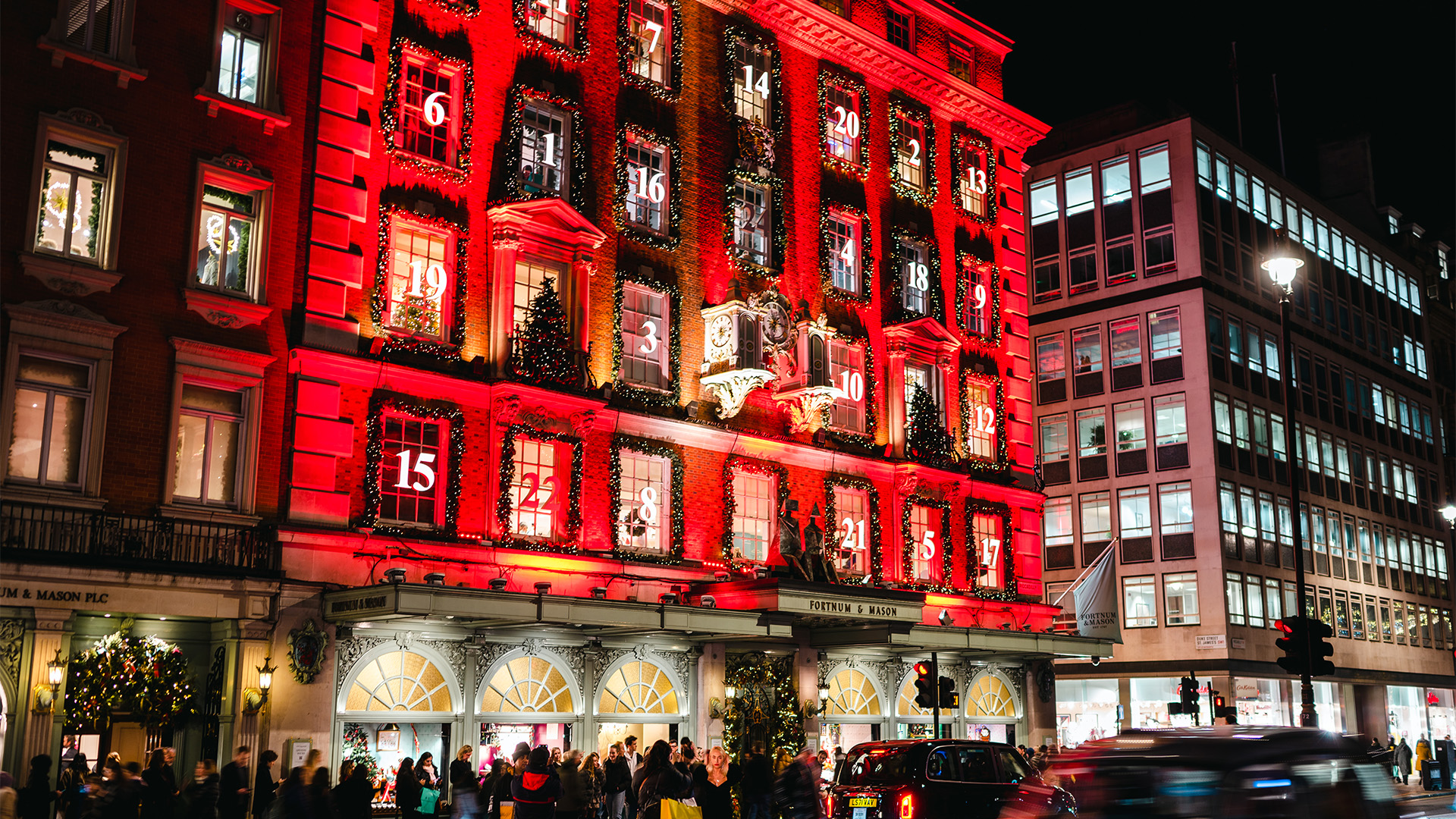 Dazzling lights decorate the exterior of Fortnum & Mason on Piccadilly