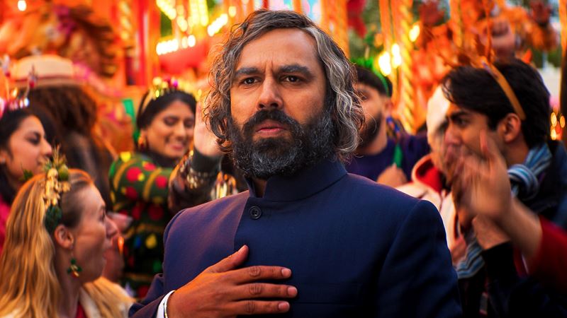 Kunal Nayyar in Christmas Karma. Credit: True Brit Entertainment. A still of Kunal Nayyar in Christmas Karma with a festive London market in the background