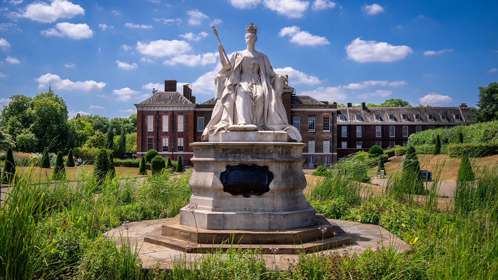 Take a stroll in Kensington Gardens and stop by Kensington Palace. Image courtesy of London&Partners/ Peter Cohen A statue of Queen Victoria stands outside Kensington Palace.