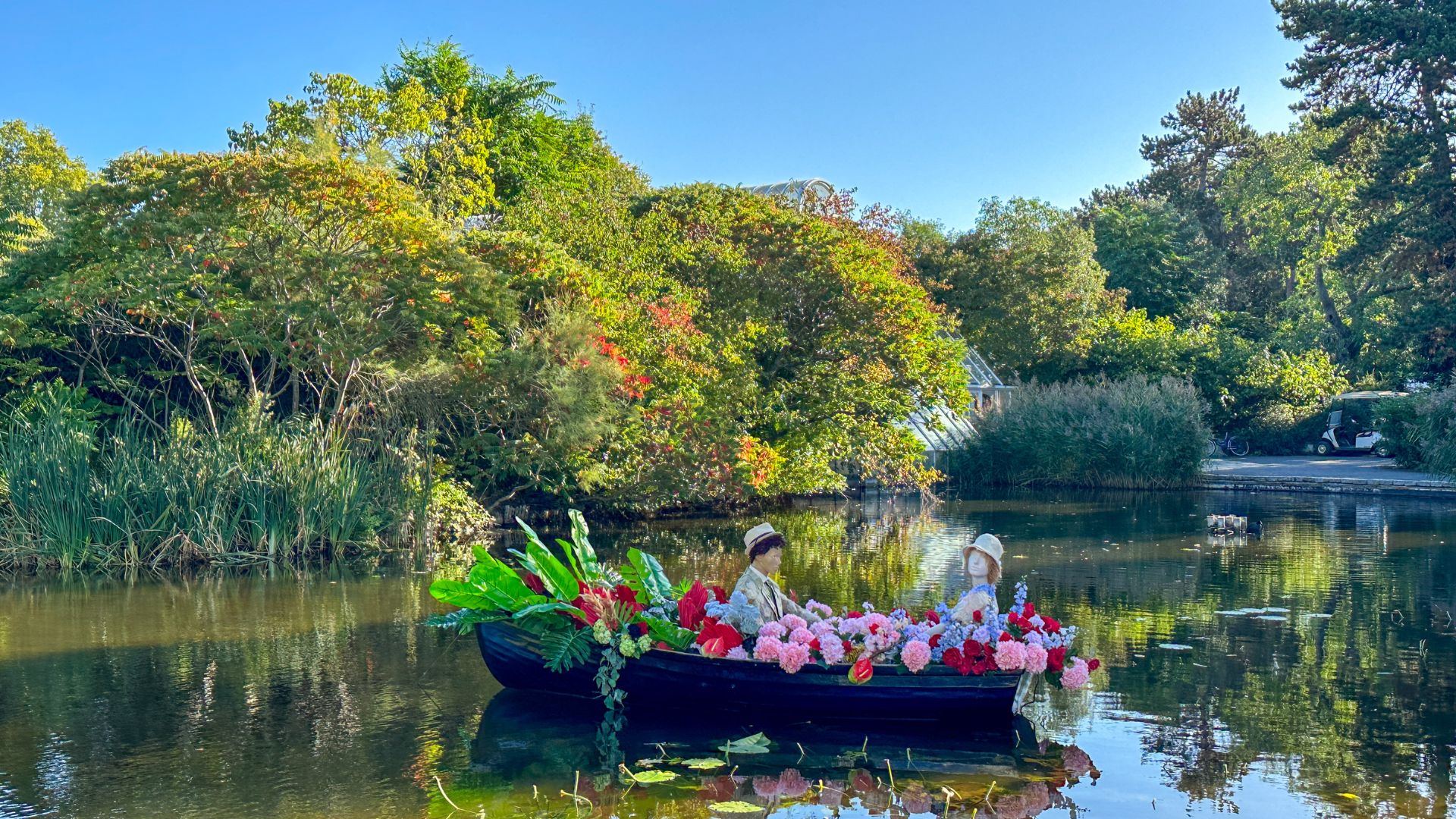Lady Rose and Jack Ross share a romantic rendezvous on a rowboat at the Downton Abbey exhibition at Kew Gardens