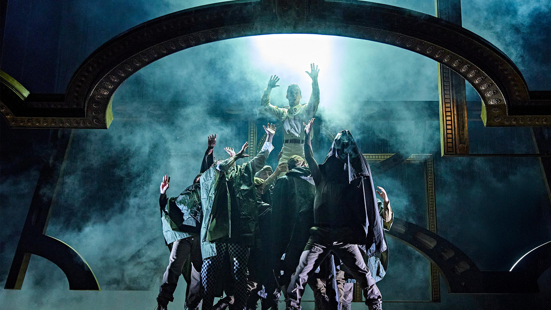 Ti Green's set design creates a tense atmosphere in Othello at Theatre Royal Haymarket. Image courtesy of London Theatre Direct/Brinkhoff-Moegenburg. Smoke and light projections in Othello at Theatre Royal Haymarket