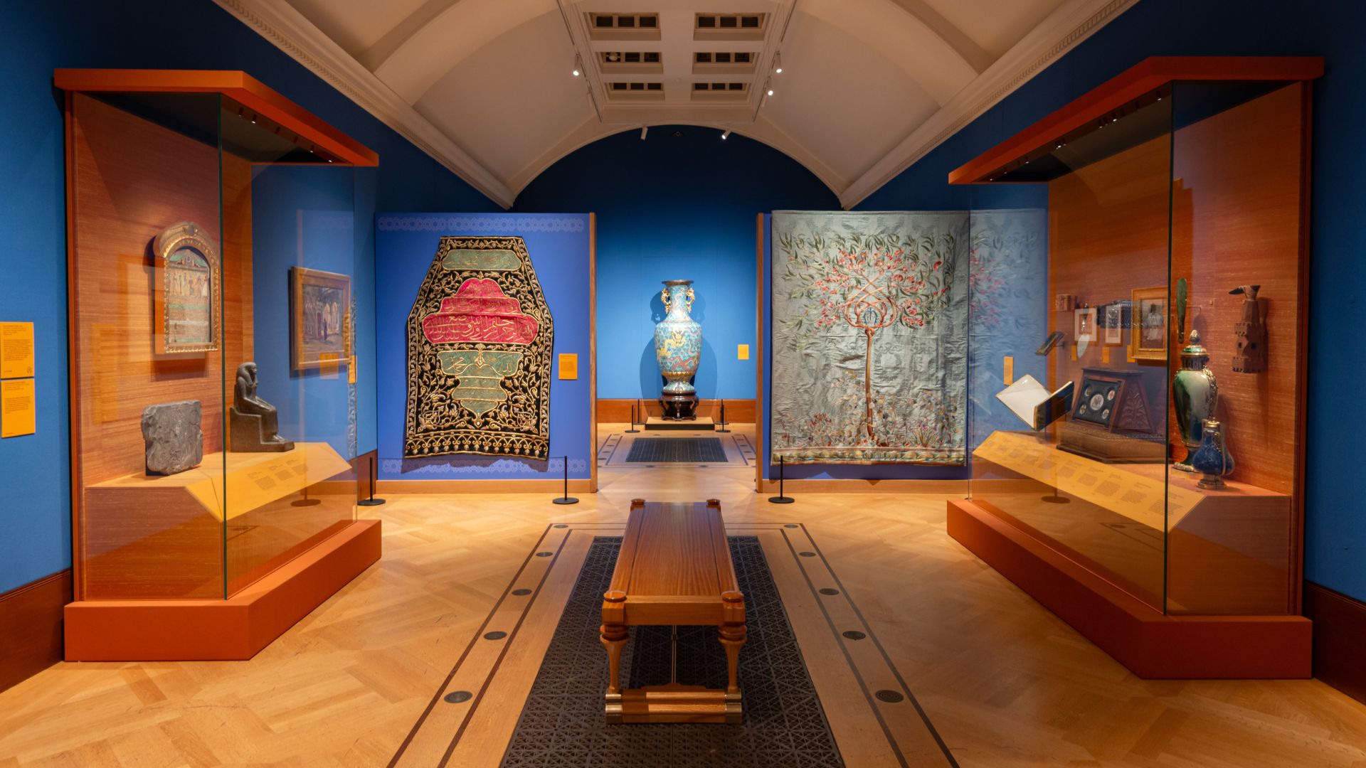 Blue room at The Edwardians: Age of Elegance exhibition at The King’s Gallery showcasing objects from royal travels.
