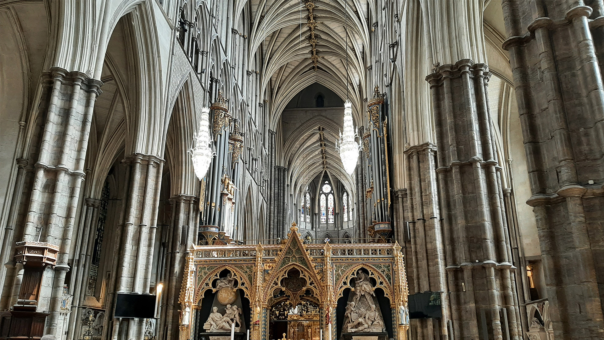 Explore the coronations tour at Westminster Abbey and admire the architecture surrounding The Nave. Image courtesy of Visit London/Sigrun Tomicki An image of The Nave at Westminster Abbey showing the intricate woodwork of The Quire screen and the magnificent architecture of the ceiling.