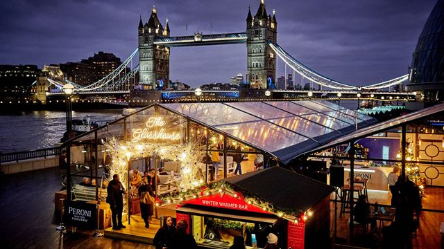 Winter by the River's glasshouse with Tower Bridge in the background.