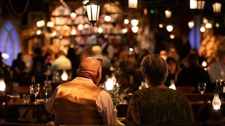 Settle into your seats at the festive immersive dining experience, The Great Christmas Feast. © Amy Williams Consultancy/Ali Wright