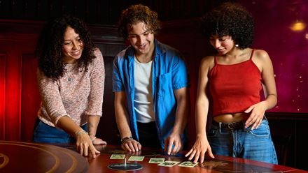 Work as a team to complete missions and win gold for the table at The Traitors: Live Experience. Image courtesy of Mance Communications.