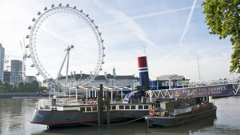 Experience afternoon tea with killer views on a floating pub. Image courtesy of Red Letter Days.
