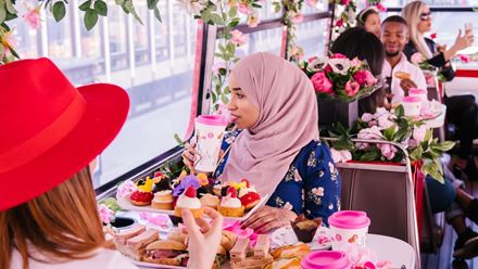 Join a Brigit's Bakery Afternoon Tea Bus Tour for a fun ride around London. Image courtesy of Brigit's Bakery Afternoon Tea Bus Tour.