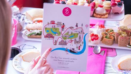 Enjoy an afternoon tea bus tour and spot famous London landmarks including Trafalgar Square and Big Ben. Image courtesy of Brigit's Bakery.