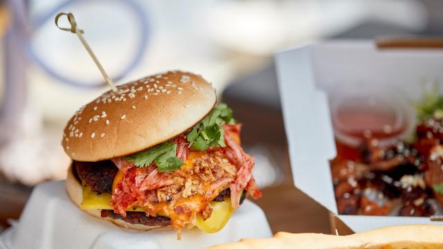 A vegan burger in a bun at Broadway Vegan Market.
