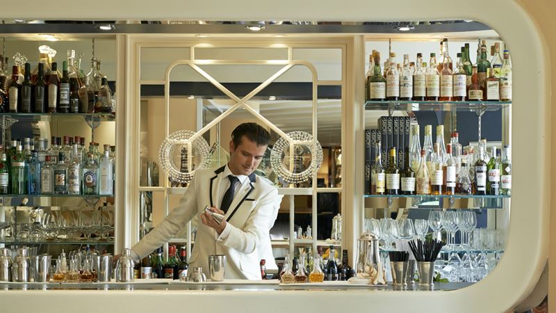 Let the expert bartenders create the perfect cocktail for you at The American Bar. Credit: Fairmont Hotels Group. Image courtesy of Fairmont Hotels Group. Bartender at the American Bar at The Savoy Hotel