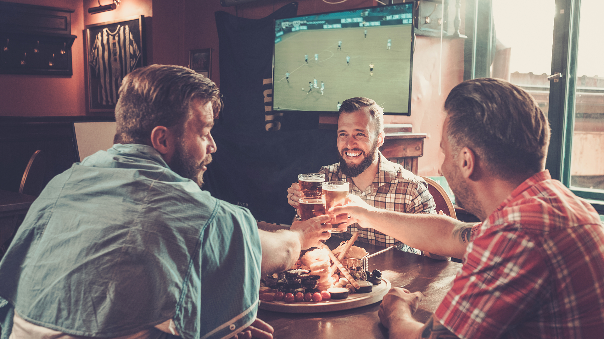 A group of friends enjoying the football and a pub lunch