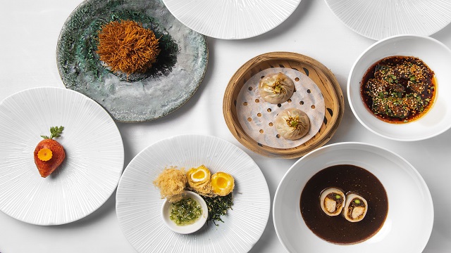 high angle shot of small plates of traditional Chinese cuisine
