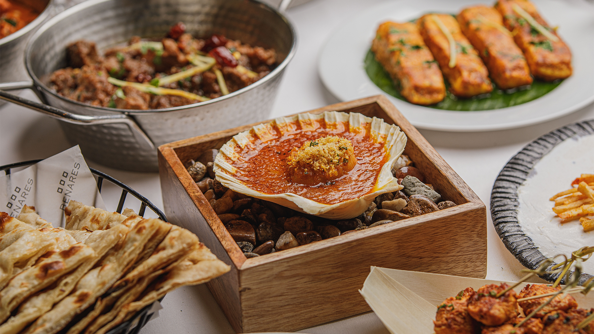A selection of Indian small plates including the baked Malabar Scottish scallop