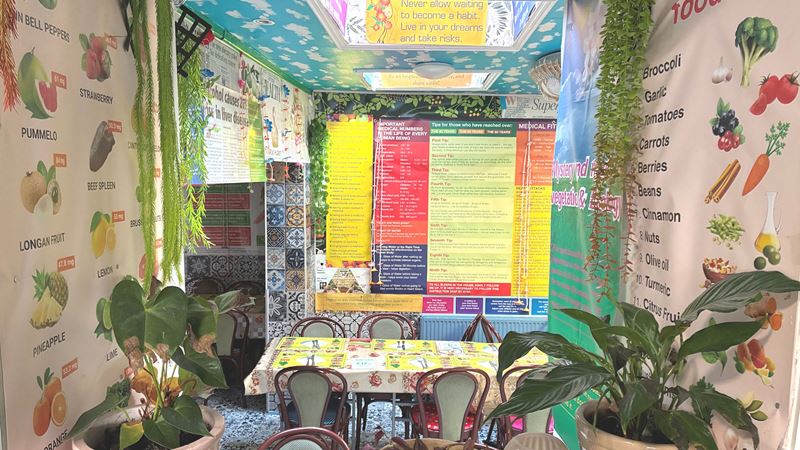 Enjoy healthy dining from the low-cost buffet at Indian Veg. Image courtesy of Jonny Payne. The colourful interior of the Indian Veg restaurant with posters on the walls discussing the health benefits of vegetables.