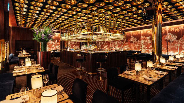 Isabel Mayfair © Curaconn PR. Image courtesy of Curaconn PR The elegant red and gold interior of Isabel restaurant in Mayfair