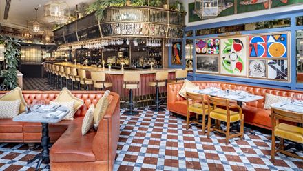 Take a seat by the gorgeous bar at The Ivy Tower Bridge. Credit: The Ivy Collection. Image courtesy of The Ivy Collection.