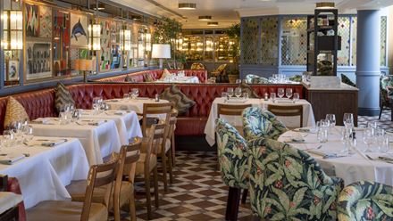 Enjoy a delicious meal in a colourful setting at The Ivy Tower Bridge. Credit: The Ivy Collection. Image courtesy of The Ivy Collection.