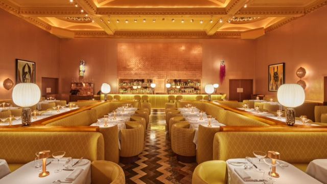 The newly renovated Gallery at Sketch with glistening gold and yellow furnishings. Image courtesy of Sketch. 