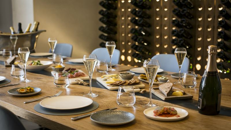 Table set up for guests at the Champagne school at St Pancras Brasserie and Champagne Bar by Searcy’s