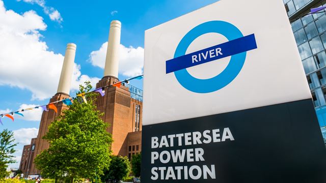 Battersea Power Station building and sign for the riverboat services.