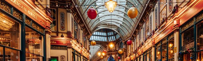 Leadenhall Market shop fronts and lights.