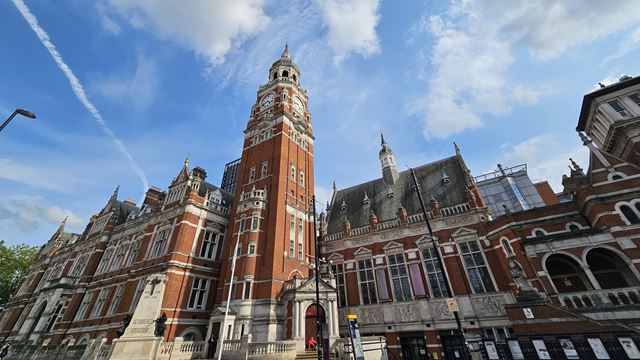 The red-brick building of Croydon Clocktower, with blue skies.
