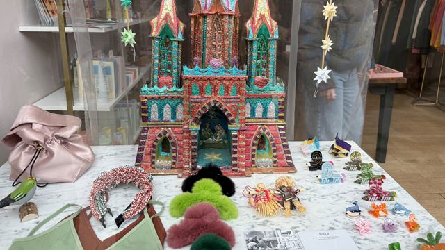 A photo of the shop window at Array on Church Street in Stoke Newington with coloured hair clips, hair accessories and more