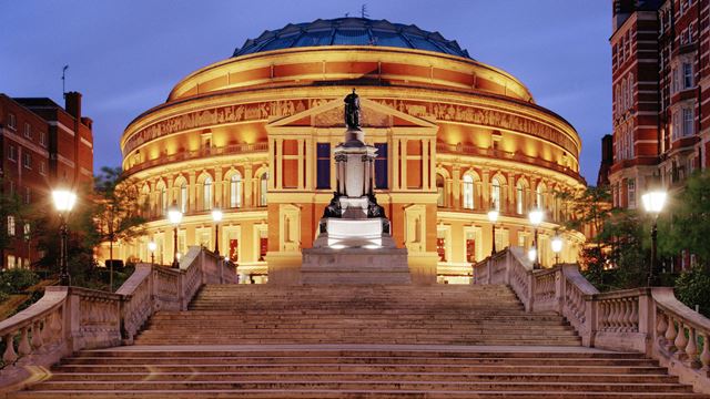 The impressive exterior of the Royal Albert Hall lit up at night