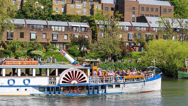 Yarmouth Belle riverboat cruising along the river Thames in Richmond.