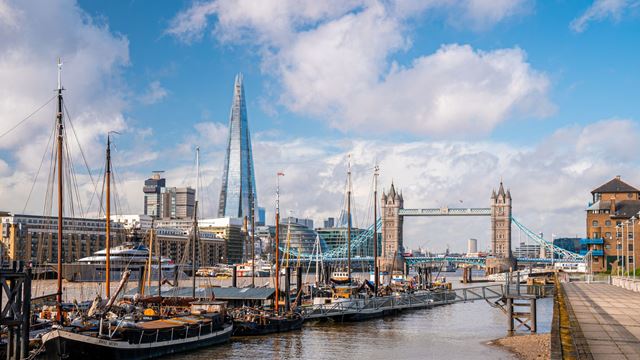 Boats on the river in Wapping, with a view of the Shard and Tower Bridge