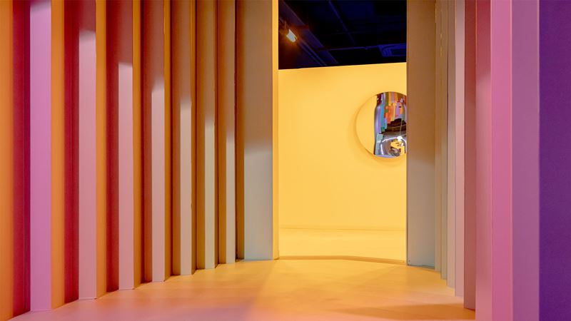 Twist Museum on Oxford Street. Image courtesy of Dan Weill. Tones of pink to yellow on staggered wall at Twist Museum.