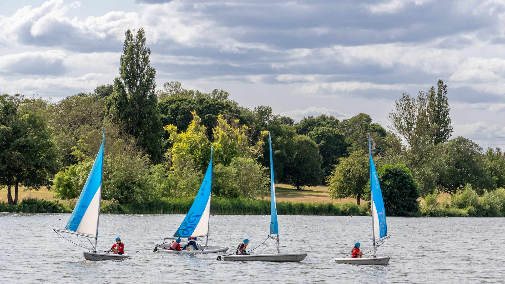 Four boats on the lake at Danson Park