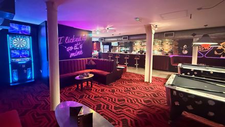 The bar area with seating and pool tables. Image courtesy of 1920 Bar.