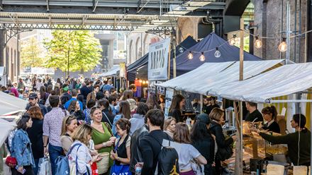 People chatting and browsing at the market. Credit: John Sturrock. Image courtesy of Real Food Festival.