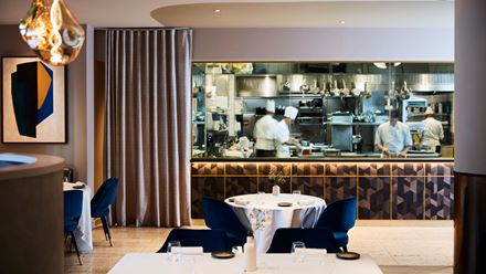 A view through the restaurant into the kitchen, Credit: Steven Joyce. Image courtesy of CORD.