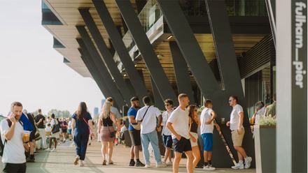 People on the boardwalk at Fulham Pier. Credit: Zoeftig Ltd. Image courtesy of Premier Comms.