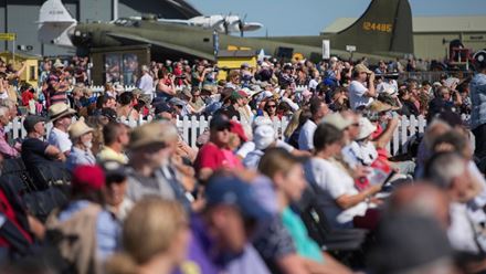 Spectators gather to watch flying displays during an event at IWM Duxford. Image courtesy of Golden Tours.