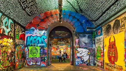 People walking through Leake Street Arches. Credit: London & Partners/Peter Cohen.