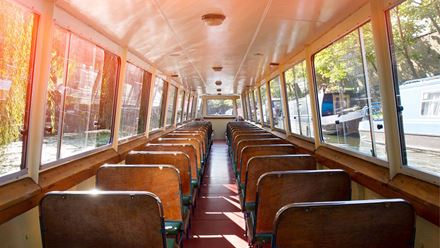 Inside a canal boat. Credit: Aaron Marcus Sutton. Image courtesy of London Waterbus Company.