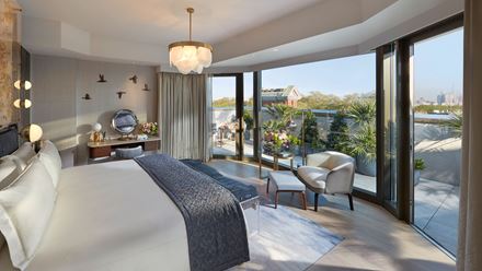 A bedroom in a penthouse suite. Image courtesy of The M Collective.