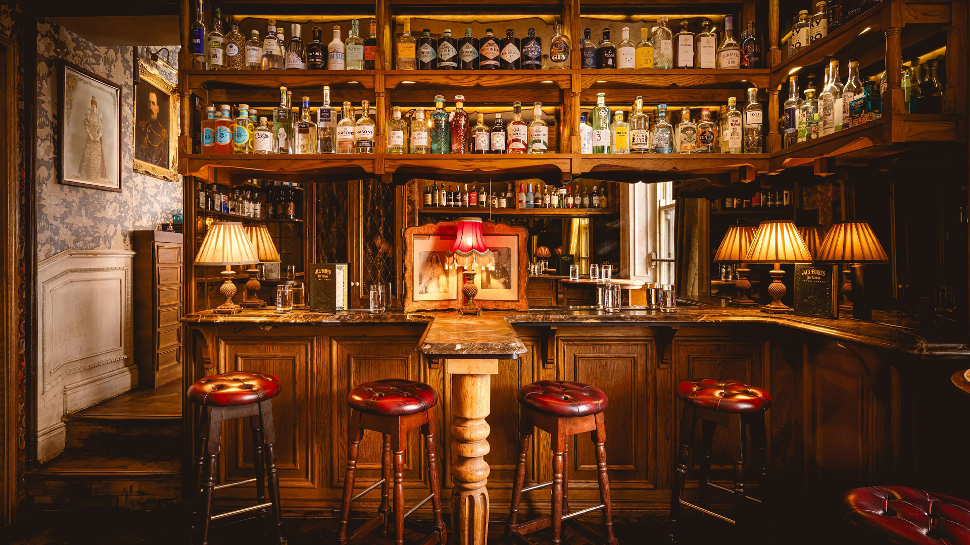 Bar stools arranged around the bar in Mr Fogg's Gin Parlour.