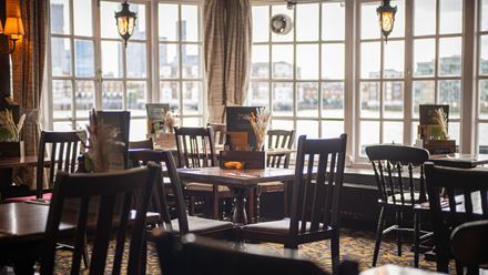 A river view from the dining room. Image courtesy of Greene King.