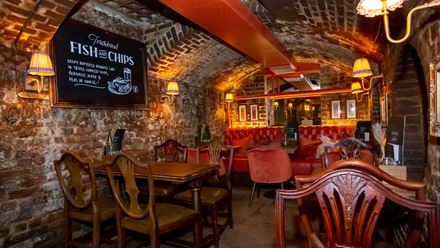 A bar at Punch & Judy Covent Garden. Credit: Grainge Photography. Image courtesy of Greene King.