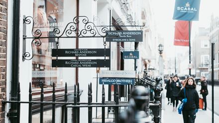 Shop signs on Savile Row. Credit: Matt Flynn. Image courtesy of Goad Communications.