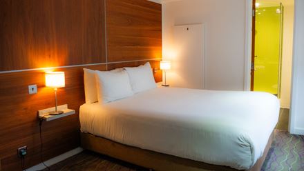 A bedroom at The Wesley hotel. Credit: Robin Prime. Image courtesy of The Wesley.